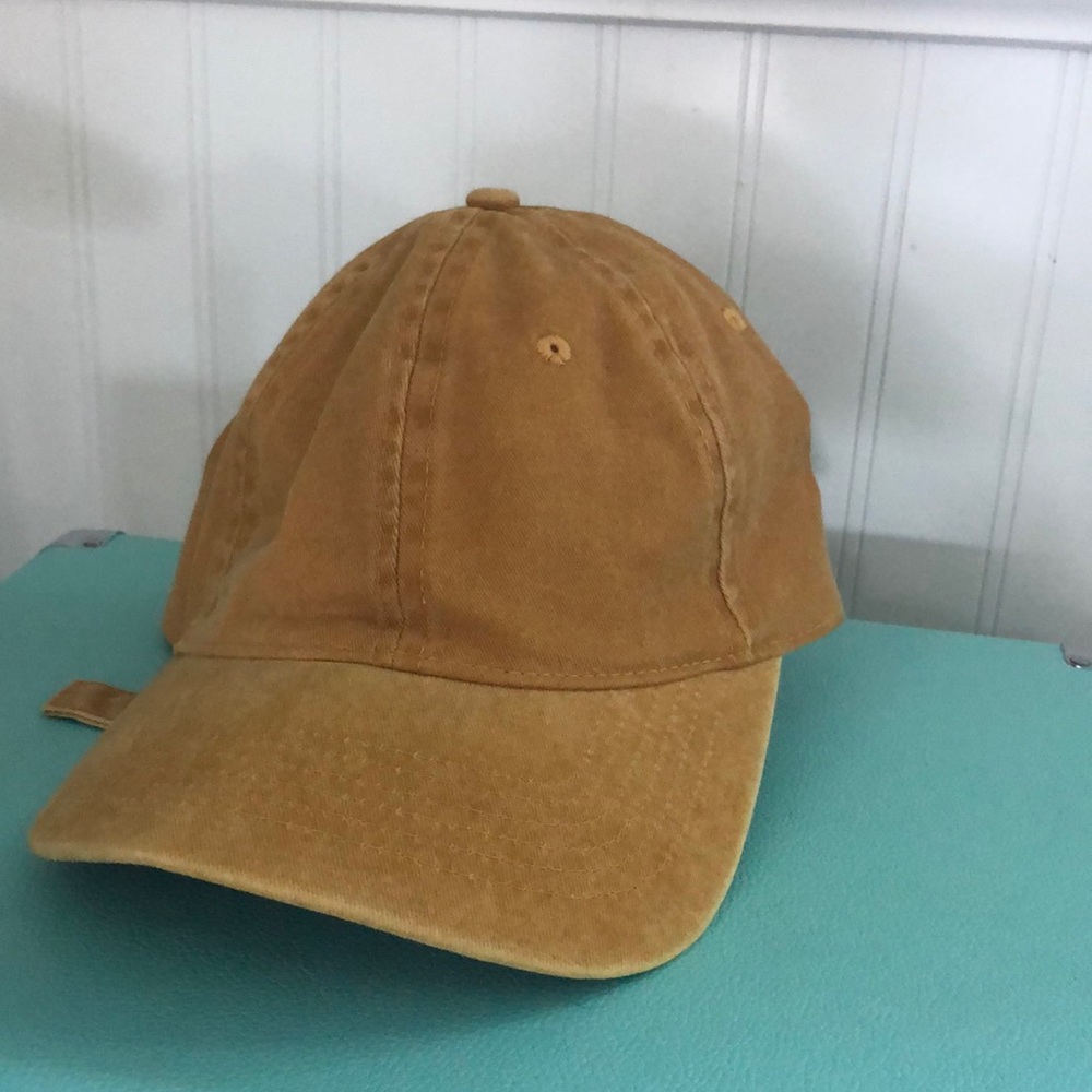 mustard yellow baseball cap